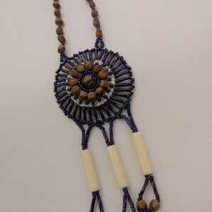 Handcrafted Beaded Necklace with Brown and Blue Accents